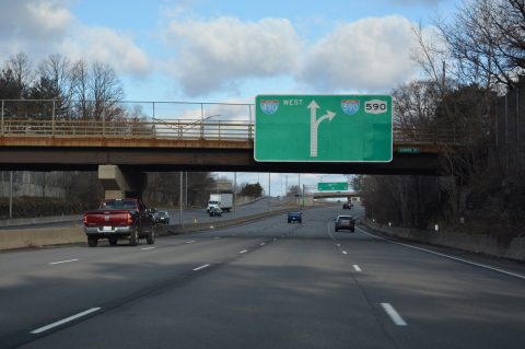 I-490 enters the Can of Worms Interchange with I-590/NY 590 beyond Clover St in Brighton.