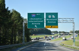 Traffic from I-675 north separates for I-285 west and U.S. 23/SR 42