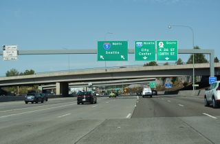 Traffic on the c/d roadway at Exit 133 separates for I-705/SR 7 and I-5 north