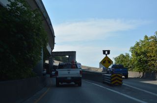 I-705 north concludes with ramps to Schuster Pkwy and Stadium Wy