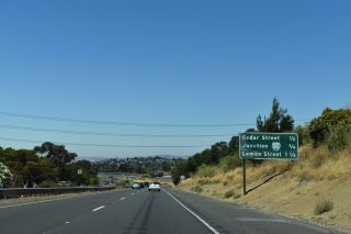 Interchange sequence sign 0.75 miles ahead of I-80 on I-780 west