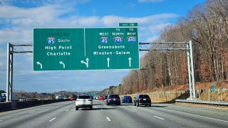I-40/85 split in a half mile at I-785/840 in Greensboro, NC.