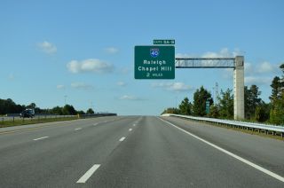 NC 885 (TriEx) north crosses Davis Dr two miles south of I-40/885.